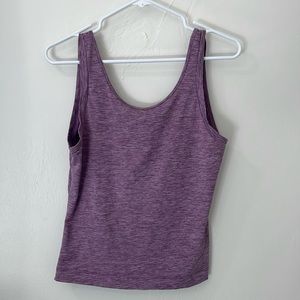 Born primitive
The studio tank
Open back
Purple
Size large